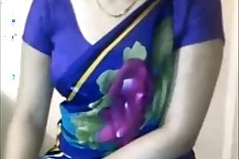 Sexy Desi Aunty boobs teasing in saree xdesitubes.com